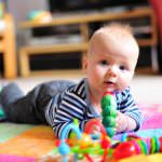 Bellies Down, Bottoms Up: Tummy Time Milestones & Activities