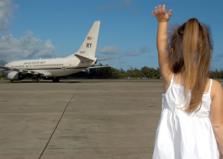 toddler waving bye-bye milestone